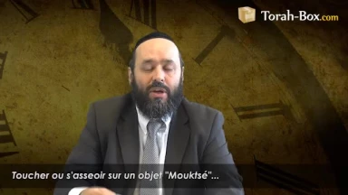 Toucher ou s'asseoir sur un objet "Mouktsé"...